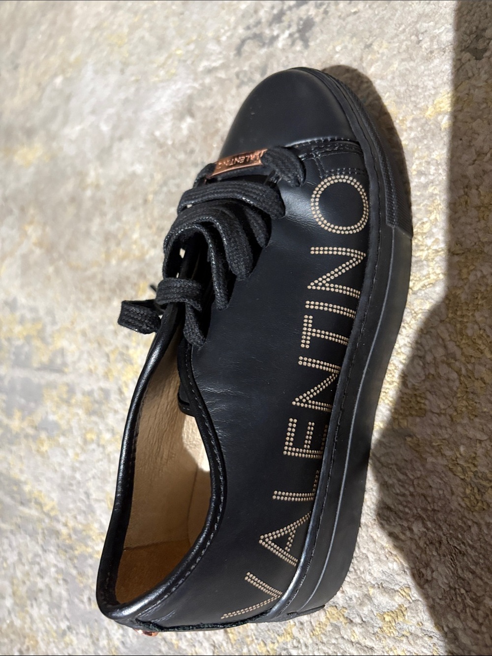 Valentino Black Leather Sneakers with Gold Tongue Detail